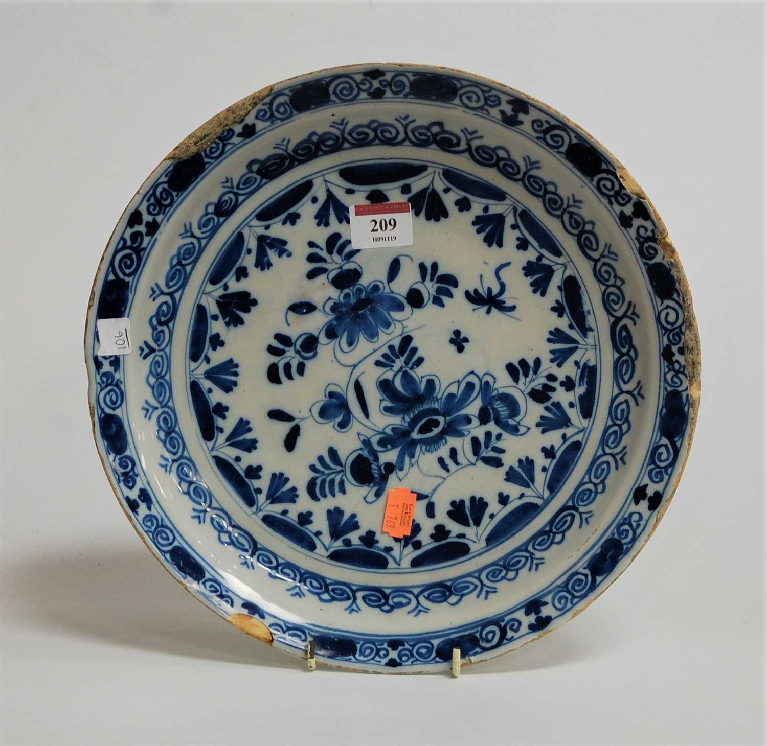 Lot 209 - A 19th century Delft blue and white plate,...