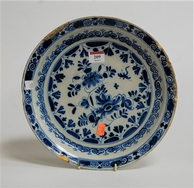 Lot 209 - A 19th century Delft blue and white plate,...