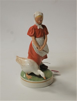 Lot 225 - A Royal Copenhagen porcelain figure of a young...