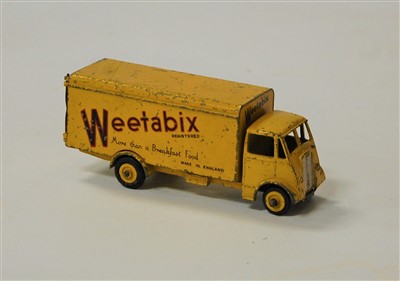 Lot 231 - A Dinky Toys No.514 Weetabix Guy van, having a...