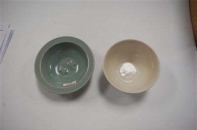 Lot 233 - A celadon glazed shallow bowl, the centre...