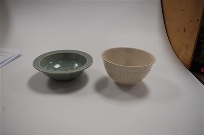 Lot 233 - A celadon glazed shallow bowl, the centre...
