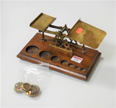 Lot 236 - A pair of Victorian brass postal scales and...