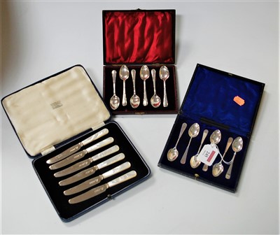 Lot 245 - A set of six tea knives, each having silver...