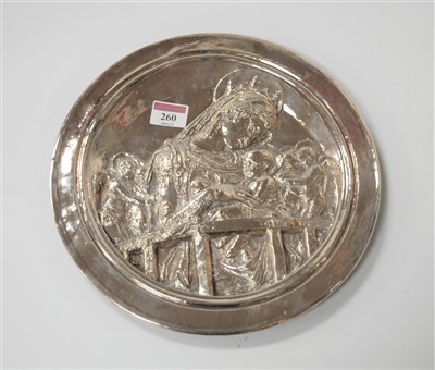 Lot 260 - A modern filled silver dish, the centre relief...