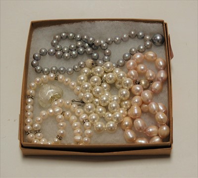 Lot 341 - A modern cultured grey pearl single string...