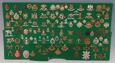 Lot 101 - A collection of British Army cap badges and insignia
