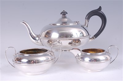Lot 2084 - A George V silver three-piece tea set,...