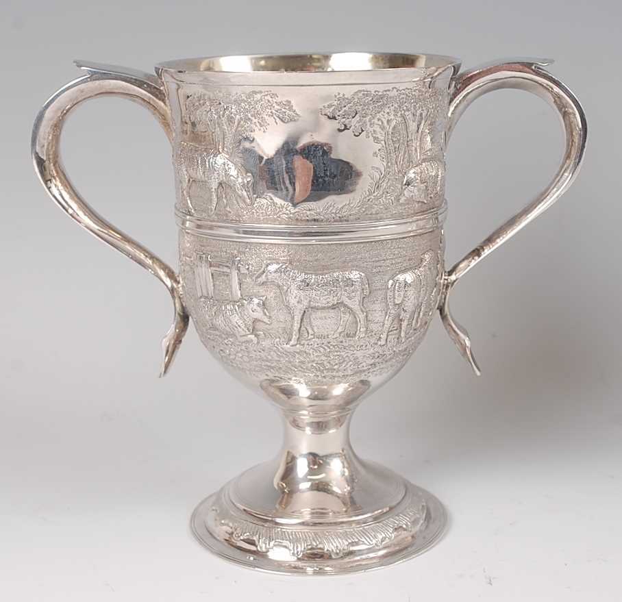Lot 2089 - A late Georgian silver pedestal loving cup,...