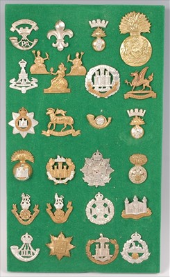 Lot 109 - A collection of British Army cap badges and insignia