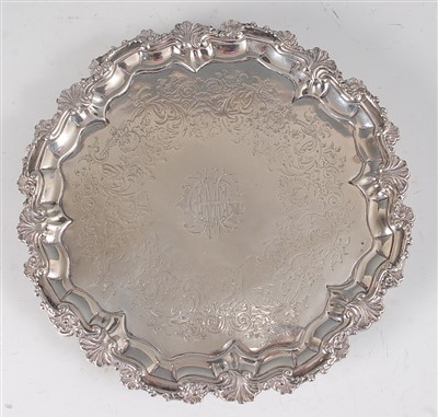 Lot 2092 - A George IV silver salver, having a leaf and...