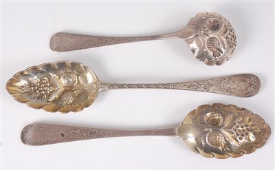 Lot 2098 - A George III silver berry spoon and one other...