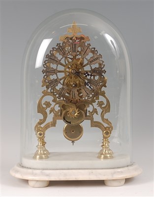 Lot 2466 - A late Victorian brass skeleton clock, having...