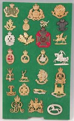 Lot 110 - A collection of British Army cap badges and insignia
