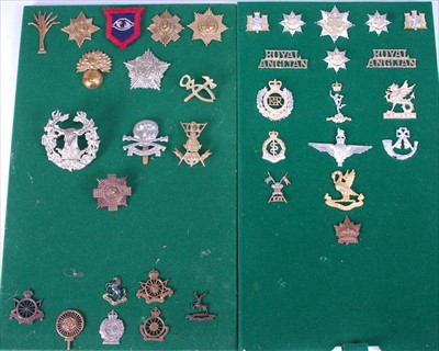 Lot 115 - A collection of British Army cap badges and insignia