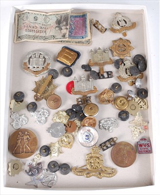 Lot 300 - A collection of cap badges, buttons and bank notes