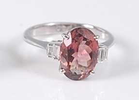 Lot 2181 - A white metal, pink tourmaline and diamond...