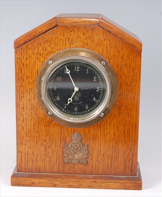 Lot 79 - An early 20th century Smiths oak cased mantel clock