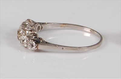 Lot 2226 - A white metal diamond five-stone half hoop...
