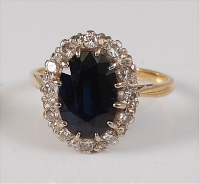 Lot 2225 - A yellow and white metal, sapphire and diamond...