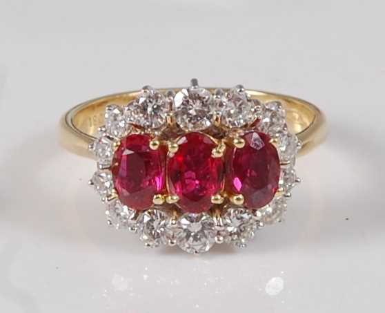 Lot 2204 - An 18ct yellow and white gold, ruby and...