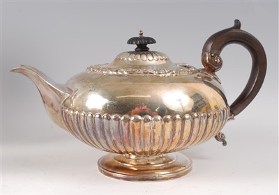 Lot 2117 - A William IV silver teapot, of half-reeded...
