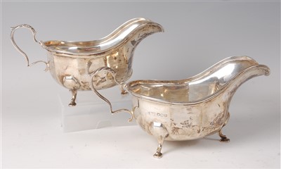 Lot 2073 - A pair of silver sauceboats in the Georgian...