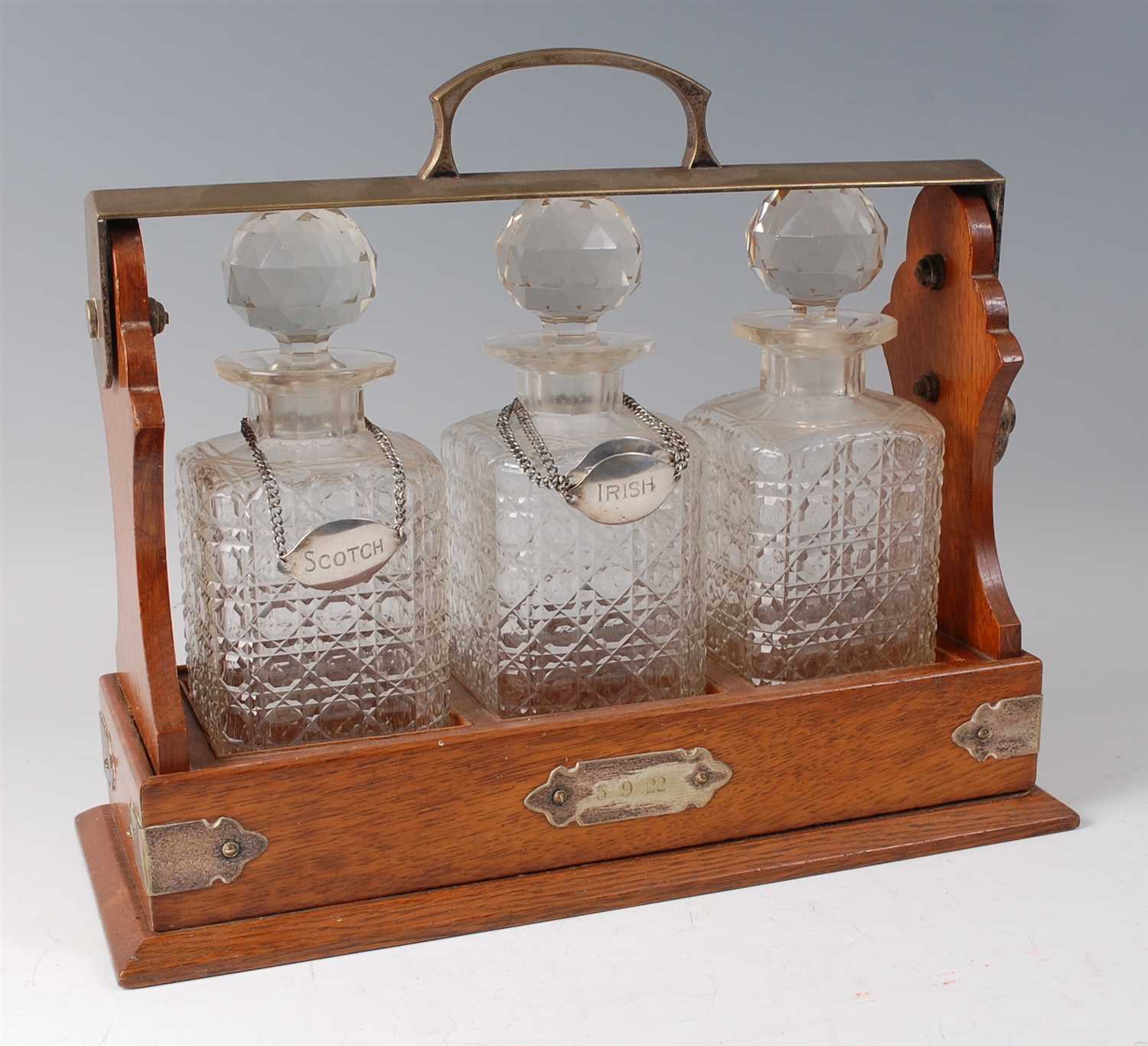 Lot 2270 - A late Victorian oak and silver plated three...