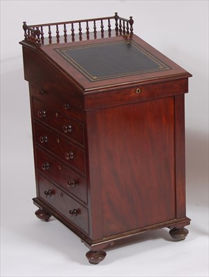 Lot 2566 - A George IV mahogany slopefront slide top...