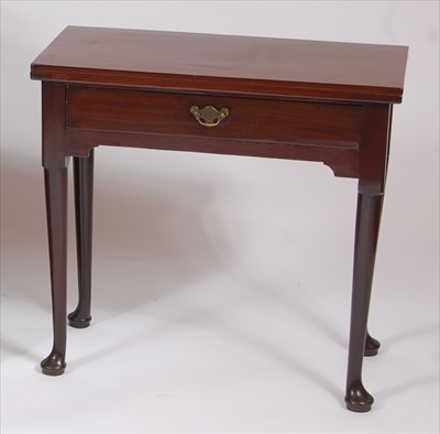 Lot 2567 - A mid-18th century mahogany fold-over tea...