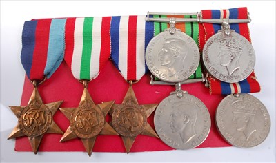 Lot 355 - A group of seven WW II medals to include