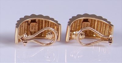 Lot 2146 - A pair of Tiffany & Co yellow metal corrugated...