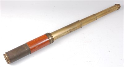 Lot 270 - An early 20th century brass and mahogany clad three drawer telescope