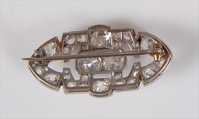 Lot 2140 - An Art Deco white metal diamond set lozenge...