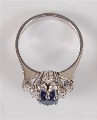 Lot 2218 - A white metal, sapphire and diamond marquise...
