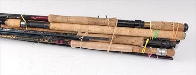 Lot 518 - A large collection of modern fishing rods and nets to include