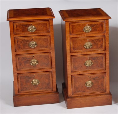 Lot 2501 - A pair of figured walnut cross and feather...