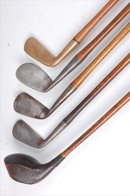 Lot 530 - A collection of six golf clubs, each with a hickory shaft to include