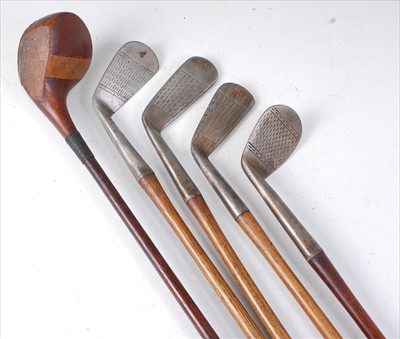 Lot 531 - A collection of five golf clubs, each with a hickory shaft