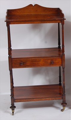 Lot 2580 - A Regency rosewood three tier whatnot, the top...