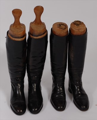 Lot 455 - A pair of mid-20th century black leather calf length riding boots