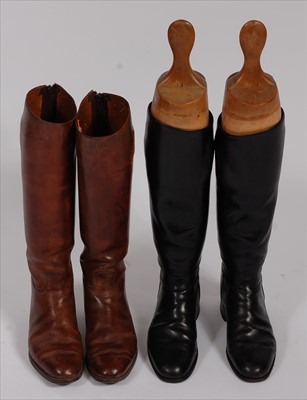 Lot 532 - A pair of mid-20th century black leather calf length riding boots