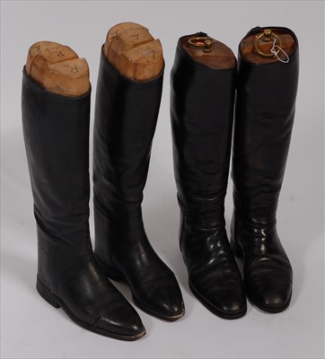 Lot 533 - A pair of mid-20th century black leather calf length riding boots