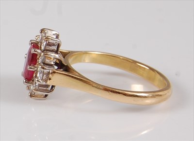 Lot 2219 - A yellow and white metal, ruby and diamond...