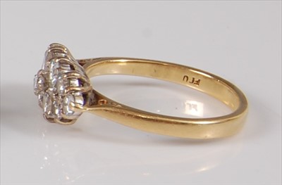 Lot 2185 - An 18ct yellow and white gold diamond marquise...
