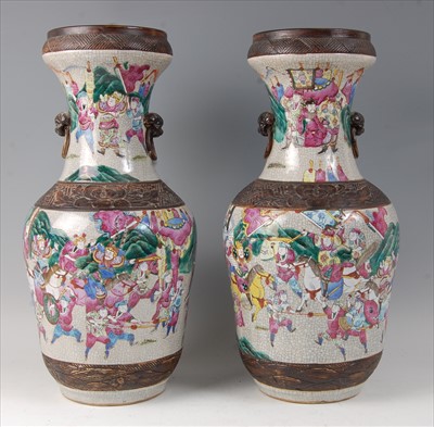 Lot 2316 - A pair of Chinese famille rose crackle glaze...