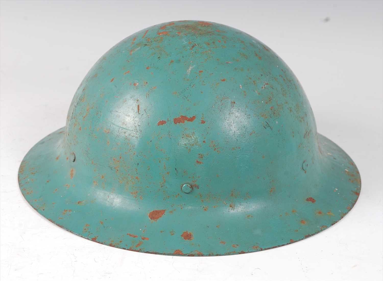 Lot 432 A Brodie pattern blue painted steel helmet