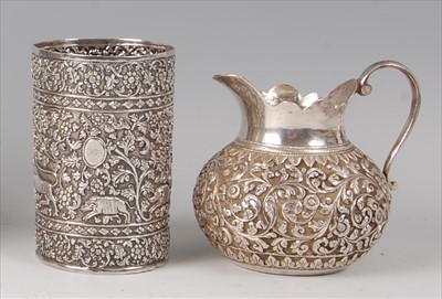 Lot 2344 - A late 19th century Indian silver beaker,...