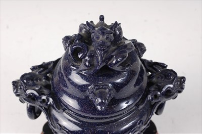 Lot 2336 - A Chinese carved blue glass censor and cover,...