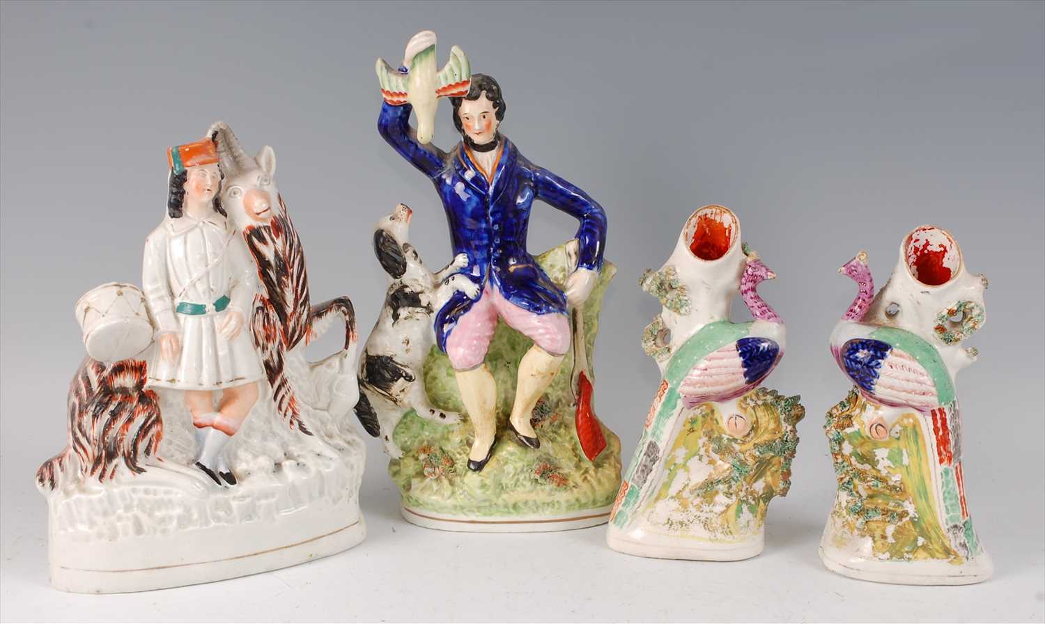 Lot 2057 - A Victorian Staffordshire figure of a...